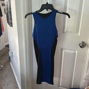 Blue with blk side panels giving it a svelte look